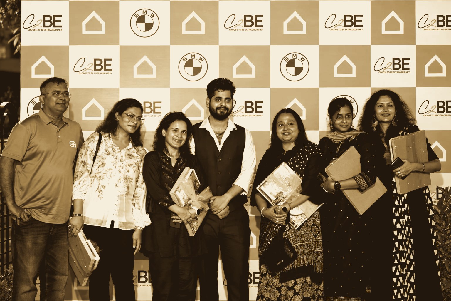 Guests at an Ashley and BMW event backdrop, Jamshedpur